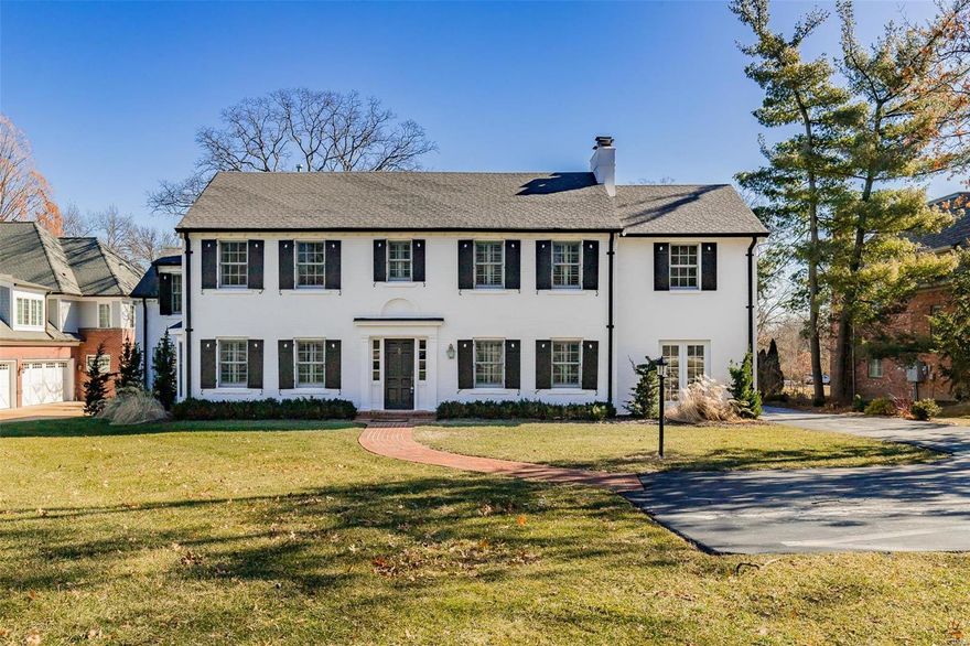 This one's a classic! From its gracious exterior to its beautiful interiors, you'll love this updated home in Ladue schools. Both the formal living room w/ gas fireplace and built-in bookshelves and the sun-filled family room  have French doors to the flagstone and trellis-covered patio overlooking the spacious, landscaped yard. Entertain your guests in the formal dining room w/ bay window after whipping up a feast in the double island kitchen w/ white Wood-Mode cabinets, granite counters, breakfast room and sitting area. Upstairs, you'll be wowed by the spacious master suite with its updated bath w/ heated floors, jetted tub, rainfall shower head and private home office/den as well as three more large bedrooms and two full baths plus second floor laundry. Sits on over an acre professionally landscaped lot & backs to trees. Zoned systems. Wired for sound system. Recreation rm in LL w/wet bar, 1/2 bath & storage area. Attached garage. Convenient to 64/40, downtown Clayton, and shopping. Additional Rooms: Mud Room