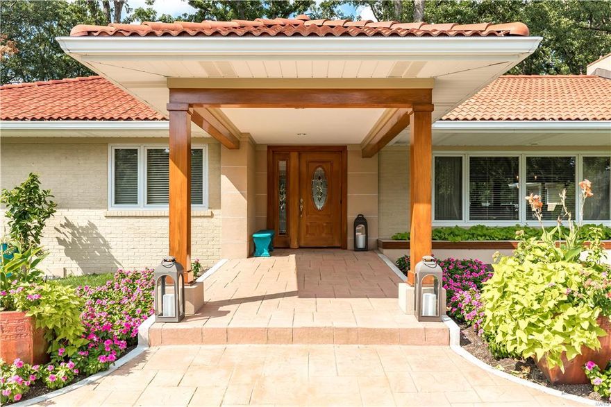 A special retreat nestled on a prized acre lot in the long established community of Holiday Lane! This completely renovated home has an elegant yet understated vibe, seamlessly bringing the indoor/outdoor entertaining spaces together, resulting in a home unlike any other in contention.  Owners have so thoughtfully and tastefully renovated throughout leaving no detail overlooked, a true testament of the ambience that has to be experienced to appreciate.  Dramatic new kitchen surrounded by an enormous spans of floor to ceiling windows - open to the family room and separate dining space.  A serene and private master wing addition fit for a king and queen with private access to everything this gorgeous backyard oasis has to offer including pool, tennis court and lovely greenspace.  Opposite wing of home hosts a bedroom suite, 2 additional bedrooms and newer bath.  A truly unique retreat situated among Ladue schools and bordering the every popular Town & Country trail system.