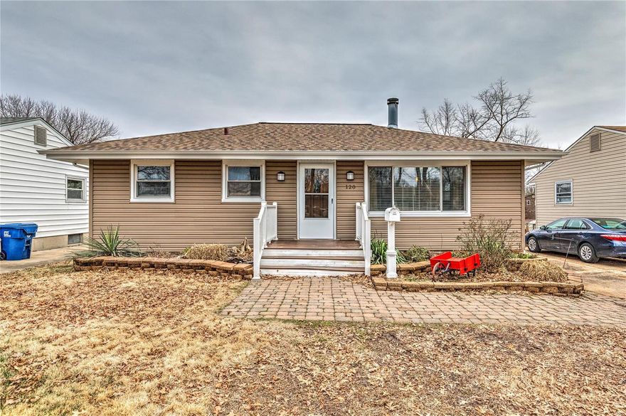 This adorable ranch welcomes you right in and has so much to offer. Original hardwood floors on most of the main level. The living room has a beautiful fireplace and lots of charming character. Off the living room is the 3rd bedroom. This room would also make a perfect dining room or home office. The updated kitchen has lots of storage. The basement is mostly finished and has a great family room or rec space and an extra room. Out back you will be amazing. The covered patio is the perfect place to sit and relax. You can enjoy your morning cup of coffee or host all the summer BBQs. You won't want to leave. 

The current dining room is the 3rd bedroom. Seller is willing to add doors before closing.