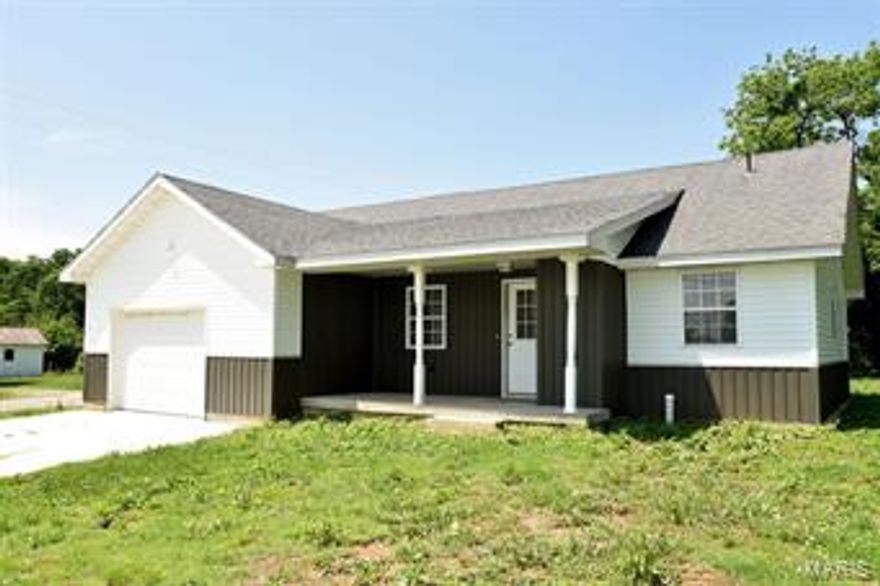 Owner is a contractor and has rebuilt this home from the bottom up. Everything is new and he is offering a contractor's 6 month warranty on everything. Greg Cheek is well know around the area for his attention to detail and it shows in this home. The kitchen has new oak cabinets and easy to care for floors. Two bedrooms downstairs with a loft bedroom to make this charming house perfect for a starter home or a small family. Large lot that has the propane tank included. Call today for easy access. This home will qualify for VA, USDA, FHA type loans. First time home buyers cannot go wrong and with the contractors warranty they can purchase with the security in knowing they will be covered. The roof is 5 years old, but everything else is brand new.