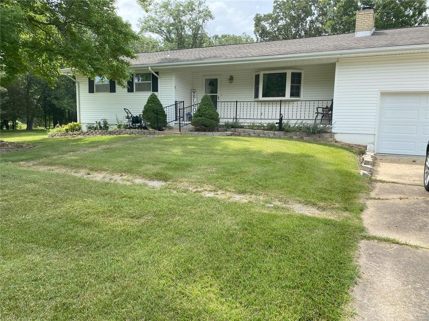 Want year round fun?  This lake development has everything you need.  326ac lake with public docks, beach, community center, playground with pavilions, tennis courts, marina, ball fields and much much more.  Check this out at ilpoa.org 
This 3 bedroom, 2 bath home is located on 3 lots.  Enjoy the fenced yard, covered deck, 2 car attached garage and walkup basement. Make an appointment today.  At this price it won't last.