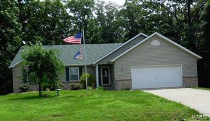 Mr & Mrs Clean live here in this extremely well maintained atrium ranch. Located close to the back gate entrance of Lake Sherwood, very level lot, peaceful area surrounded by trees and very little traffic. Large master bedroom with private bath, two additional bedrooms served by the hall bath, eat in kitchen/dining combo, great room with wood burning fireplace, the laundry room is right off of the two car garage, mega size deck on the back of the home which makes a perfect setting for entertaining. The finished lower level has a recreation room, large fourth bedroom, bath and lots of storage on the unfinished side. Lake Sherwood has 6 lakes, main lake is 140 ac and allows water skiing, 24 hr security, clubhouse, pool, beach, marina and campground. The community of Lake Sherwood is heavily wooded and the common areas have been left in a natural state with lots of woods and trees for wild life habitat. Some Accessible Features