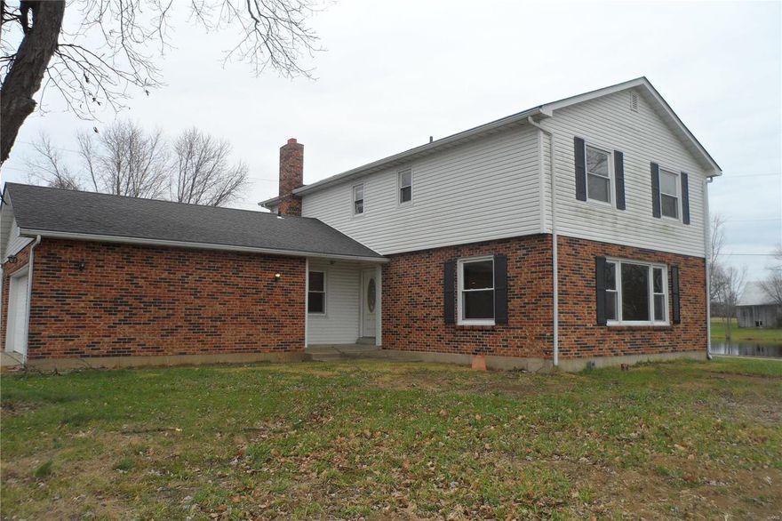 Excellent location.  Home has perfect setting in the country, but right at the edge of town.  Two stories, 4 bedrooms, 1.5 baths on just over an acre of ground.  Must see!  Immediate possession after closing.