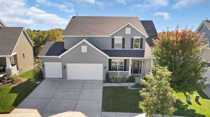 Better than new! This 1.5-story home in Fienup Farms offers exceptional quality and craftsmanship. The upgrades and like-new condition make it special. The expanded floor plan includes additional square footage and soaring ceilings, highlighted by a two-story Great Room. The kitchen is a dream, featuring GE Monogram appliances, lighted cabinetry, tiled backsplash, and a large central island, with access to a screened porch overlooking the private yard backing to wooded common ground. The main-floor master suite boasts a custom walk-in closet and a luxurious master bath. Upstairs, find three spacious bedrooms, two well-appointed bathrooms, walk-in closets, and a huge flexible loft area. Outside, the custom Baker-built swimming pool is seamlessly integrated into the patio, decking, and landscaping. Extra Feature: electric car charger in garage! Enjoy the amenities of Fienup Farms, including walking paths, 26 acre lake, and playgrounds. Located in the most vibrant part of Chesterfield!