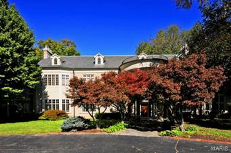 Significant price reduction! Stunning, 8,700 square ft estate boasting 5 bedrooms & 6.5 baths situated on 2.83 acres of beautiful landscape that includes a swimming pool and a tranquil, blue reflecting pond tying this majestic appearance together. I. E. Millstone built this custom home in 1936 featuring a grand living and dining room with approx. 11 ft. ceilings and elegantly detailed millwork throughout the entire house! Other amenities include an impressive 5 car garage, substantial walnut doors throughout, in the basement, a regulation size basketball court, a main floor guest quarters with its own private entry, and main & second floor laundry rooms. Attic and basement display, attractive, strapping, heavy-duty, Steel Beams to help support structure....Rock of Gibralter....Nothing can move this house! This home has such a lovely history, looking forward to sharing it with you.