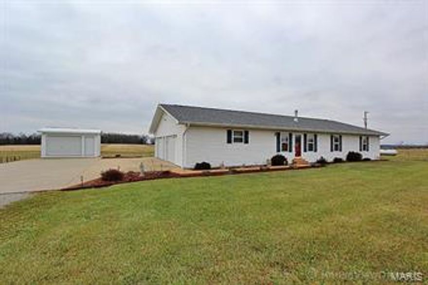 Beautiful 3 bedroom 2 bath home located on 14.95 acres outside of Farmington! Spacious rooms throughout… gas fireplace in the living room, separate dining room wonderful for your family dinners! Stepping outback you’ll enjoy the above ground pool with deck that overlooks the almost 15 acres of pasture. Nice horse barn as well as an additional outbuilding great for storage or for your hobby area. Call today for your tour of this property!