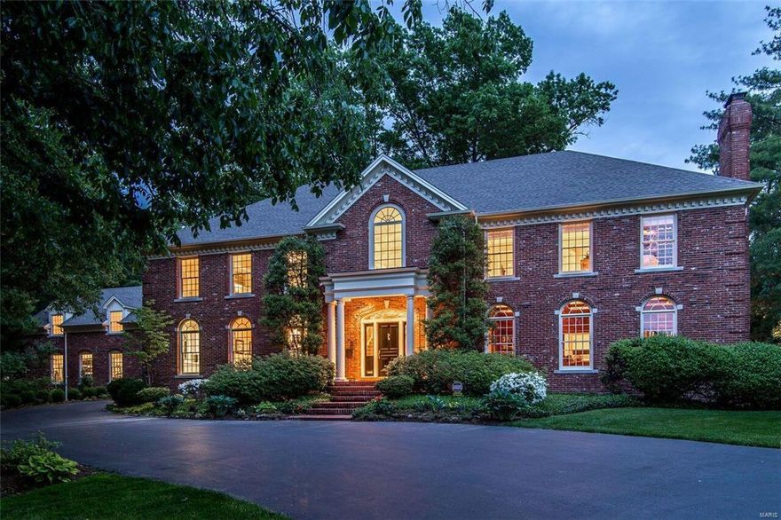 Located on tradition-rich Carrswold Drive, this inspired residence has been re-imagined in space and detail to create a one-of-a-kind, modern Georgian colonial. The 2-story entry hall showcases a sweeping staircase, stunning granite tile floor and a striking sightline all the way to the pool.  Perfectly arranged for fine dining and entertaining, the formal dining room, formal living room, gourmet kitchen and adjoining great room with cathedral vault are sure to please.  Remarkable cherry wood paneled office with pocket doors, built-in wet bar, gas fireplace and more.  On warm summer days enjoy a drink in the light-filled atrium before a swim in the pool.  Palatial and plush, the master suite boasts its own spa-like bath, a warm fireplace, a his/hers dressing area/closet & a private entrance to a tiled balcony overlooking the pool.  The double-winged, expansive lower level includes a fifth bedroom, full bath, exercise room and massive recreation room with full wet-bar. Additional Rooms: Sun Room