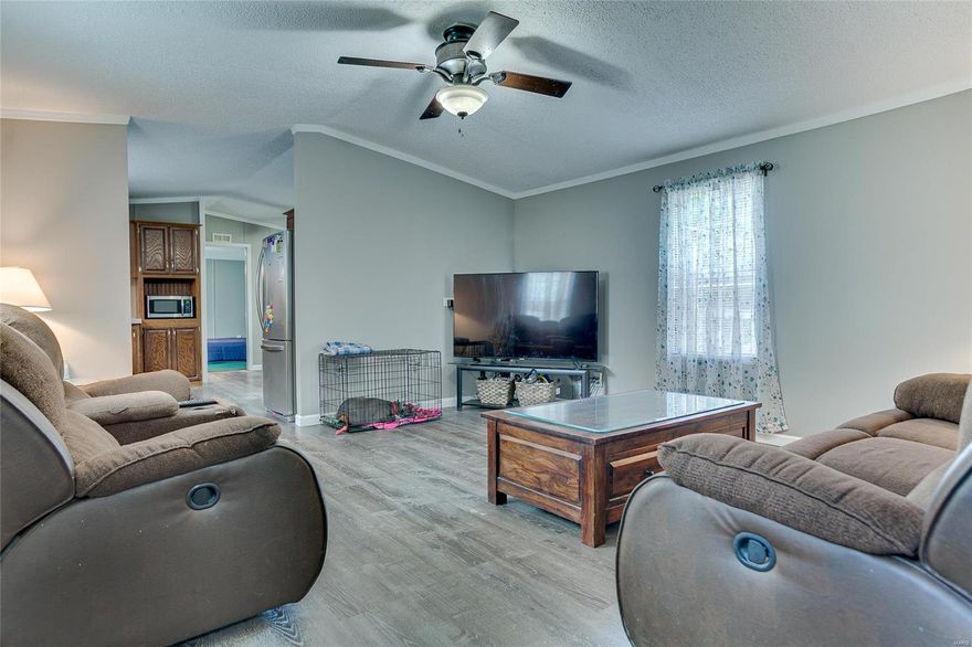 Don't miss out on your opportunity to own this newly rehabbed 3 ample sized bed 2 bath home located on a corner lot in a quiet neighborhood in sought after Hillsboro School District.  Open your new front door and notice the beautiful vinyl flooring and fresh paint throughout.  Walk through the kitchen and out the back door to your partially covered deck to relax after a long day.  Really feeling stressed?  Take a soak in your HOT TUB and let your worries melt away.  All of this for under $100k.  Hurry this one wont last long!