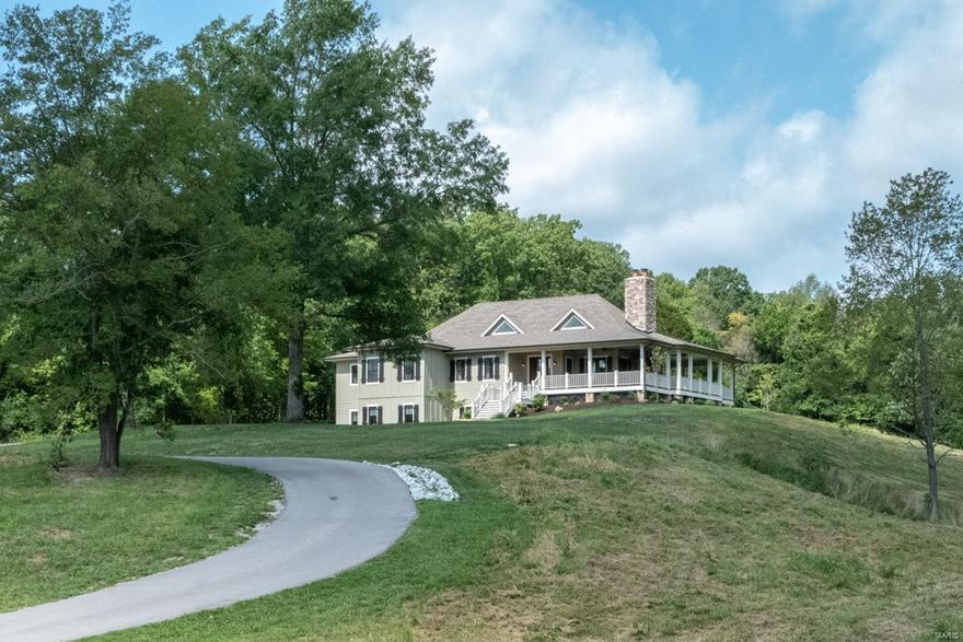 Custom home on 6.47+/- ac. Imagine relaxing on the amazing porch taking in beautiful views, sitting by the outdoor FP. Inside the home boasts 4 bedrooms & 4.5 baths & wood flooring throughout ML. Great room has floor-ceiling stone FP, 2 ceiling fans, 3 french doors to porch & chandelier. Kitchen boasts 2 dishwashers, center island, custom soft close cabinets & drawers, tap on sinks, pot filler, tile backsplash & 6 burner gas stove top. Master bdrm suite feat. large shower w/double shower heads, separate claw foot tub, double sink vanity & huge walk-in closet. 2 Guest bedrooms each w/full bath & walk-in closets. Finishing the ML is the library, dining room w/large windows, laundry room w/utility sink & tile flooring, mud room w/plenty of storage. Walkout lower level has a large rec room wet bar, ice maker & wine fridge, w/ 16x10 alcove perfect for a pool table, media room, exercise rm or office, hobby room, bedroom & full bath round of LL.  See special features sheet CHARTER INTERNET Additional Rooms: Mud Room