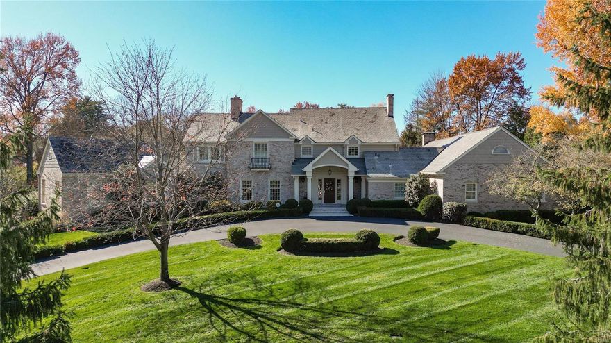 This stunning architectural masterpiece nestled in one of Frontenac's most prestigious neighborhoods boasts over 6,000 sq ft of Meticulously Maintained Living Space. This home offers a Sophisticated, Classic design that exudes Timeless Elegance. No Detail has been overlooked w the Countless Updates throughout! Idyllic setting for entertaining-- Brand New Glen Alspaugh High-end Kitchen Opens to Lrg Fam Rm, fully equipped butlers pantry, Bar area, & Custom pantry- ALL opening to outdoor spaces. The open concept Main flr flows effortlessly for Entertaining & Living. The expansive Main Flr Primary Ste complete w walk-in closet, washer/dryer, new lux bath, & Sitting rm plus Office. 3 more bedms grace the 2nd flr, each en suite (updated). Outside, the property continues to impress w/ a custom outdoor Covered patio w wood-burning fireplace, Remote Screens, putting green, built-in grill, & pool w/captivating waterfall. Circle driveway & stunning landscaping add to the allure of the exterior.
