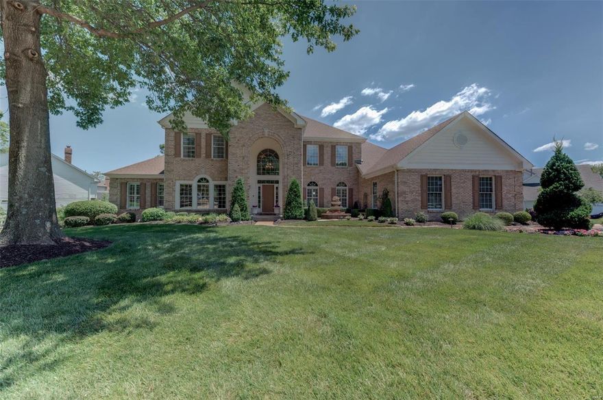 Stunning! 1.5 Sty w/6200+ sq ft. w/fin. w-out L.L. Step into this stunning 2-story foyer w/marble flrs, Formal DR dental mold crown, & Private home office w/box Beam ceiling.Dramatic great room w/fireplace,wall of windows,20 ft. high ceilings,wet bar,wine cooler.Newer kitchen w/white 42"custom cabs,5 burner gas cooktop, center island, double oven, Granite counters, Stainless appliances, glass backsplash,spacious breakfast rm,custom walk-in pantry, relax in the sunroom w/amazing view of the lush landscape and trees.Main flr master w/coffered ceiling, Newer en-suite w/garden tub,curbless shower,2 custom closets.Flooring (10). Upper level offers a bonus rm, 3 bedrms, (1 w/prvt. bath, 2 share jnj bath&walk in closets) Spectacular! LL features Rec. rm, gas fireplace,/Wall of windows, Bose speakers,Wet bar, Exercise Rm,Lg. 5th Bed. rm & full bath,w/double w-out.Spectacular updates throughout-Wood floors Main Level,Plantation Blinds, Newer composite deck (19). A very clean and well cared for.