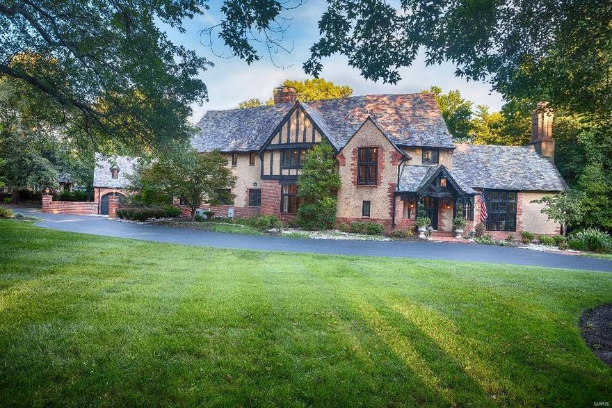 Picturesque Tudor Revival, Maritz & Young home situated on 1.6 lavishly landscaped acres. This grand historic home features architectural detail throughout beginning with the dramatic circular entry, Wrought iron staircase, stained/leaded glass wndows, terrazzo & inlaid marble floors. Main level also has: Living Rm, Dining Rm, and Sun Rm w/ terrazzo floors. Sun Rm and Family Rm both near the gourmet kitchen, Butler's Pantry w/ granite tops, Library w/vaulted ceiling, wood paneled Den-coffered ceiling & Limestone FP. Updated Kitchen boasts: Custom maple cabinetry, center island w/granite top, Viking 6 burner range/Double ovens. Bosch dishwasher, SubZero refrig, KitchenAid microwave. 2nd floor offers 4 bedrm and 4 bath. Spectacular setting includs flagstone terraces, builtin BBQ, gas starter fire-pit, hot tub & custom swmng pool. 3 car gar w/bedroom and bath up. 90% of house is remodeled/updated over 8 years. Foam insul roof with New Anderson Windows throughout. Ths home is Move-in Ready Additional Rooms: Sun Room