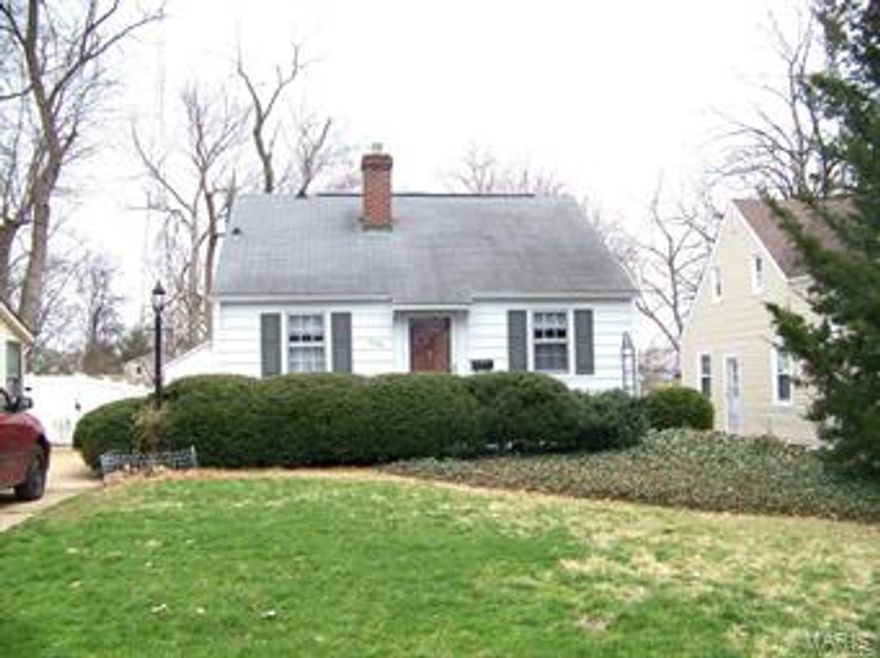 CHARMING HOME THAT IS READY TO MOVE IN! Enjoy the sitting area on the front porch. Wood floors in living room, dining and bedroom. Ceramic tile in dining area and kitchen. Dining area is open concept with updated light oak cabinets in the kitchen and pella sliding glass door to deck. First floor features living room, kitchen, dining area and bedroom. Also, full bath on main floor. Upstairs has good sized bedroom. Lower level is partially finished with an extra sleeping area and another full bath. There is a walk out to a nice sized yard with perennials galore. One car detached garage. This home is on a non-thru street and is also walking distance to a charming lake. Better hurry, it won't last long.