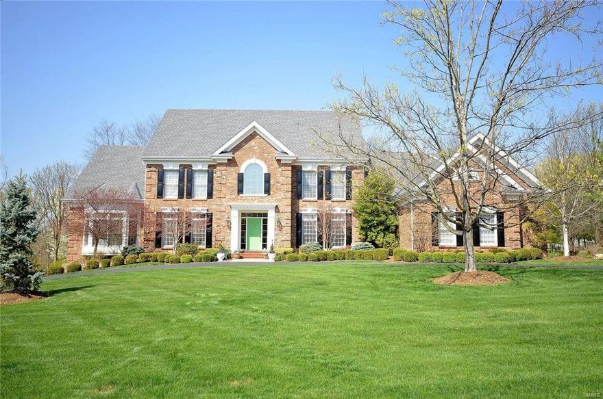 Immaculate Johnson Built Custom Home on 1.1 acre private wooded lot, only minutes to 3 major hospitals, 5 private schools and Parkway Central!  Over 6600 SF of finished living area.  One story and a half, with covered loggia, circular driveway, 5 bedrooms, 4 1/2 baths, 3 fireplaces, 2 wet bars, 3 car garage and new outdoor kitchen! New roof in 2013, two new HVAC units in 2014, updated kitchen with granite, stainless steel Dacor appliances, and hardwood floors. Gorgeous Master Suite has built ins, vaulted ceiling, double sinks, jacuzzi, his and hers closets, make up vanity and stone shower! Hearth room with floor to ceiling brick fireplace and wall of built in bookcases is welcoming and opens up to breakfast room and kitchen which is great for entertaining. Professionally finished 2,000SF+ lower level with side walkout, bedroom, exercise room, fireplace, wet bar for guests, nanny, or in- law suite.  Fresh paint and all new carpeting on second floor.  Exceptional Value in Great Location!