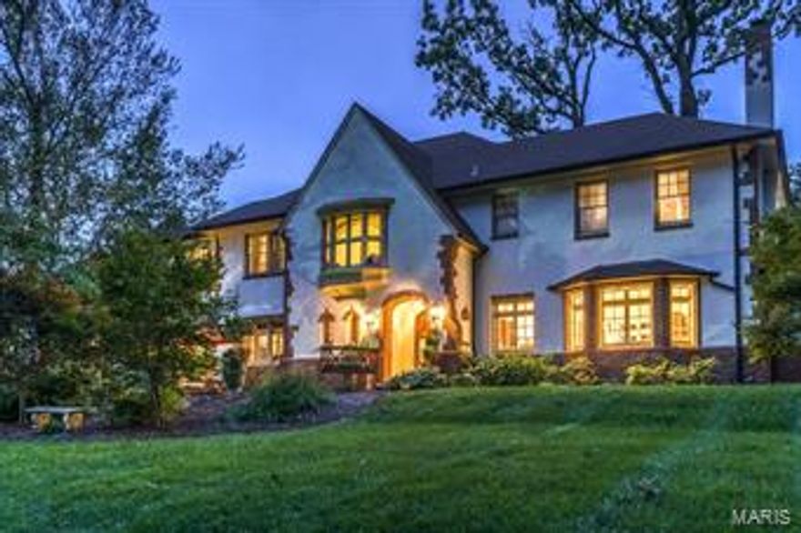 Back on Market!! This English Tudor home sits gracefully on over an acre of landscaped grounds.  5 bedrooms 5.5 baths, fin. lower level with wine cellar.  Original shaker style walnut paneling greets you in the spacious entry foyer.  French doors, warm wood floors and original millwork throughout creates such a traditional feel.  Hide away in the private library or on the glass enclosed sun porch.

Entertaining opportunities are endless here with a front patio, back patio boasting a fabulous pergola, in-ground pool,  and open floor plan.  This home has great flow.  The updated kitchen offers Sub Zero, new gas cook top, warming drawer, center island and tons of storage space.  

The master suite is a private get-away with private bath and wood burning fireplace.  Three additional bedrooms have en suite baths.  Box bay windows and window seats adorn this exquisitely appointed home.  After finishing the day at the pool, entertain your friends in the comforts of your own wine cellar!! Additional Rooms: Sun Room