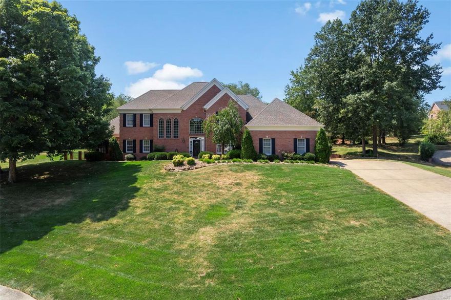 This immaculate home has the WOW factor! Located in Cape on a private cul-de-sac, this all brick, 5 bedroom, 5 bath home is a must see! Walk into the gorgeous foyer with a 2 sided balcony that overlooks the living room filled with natural light. The gourmet kitchen boasts double center islands, 6 gas burner stove with double oven and separate breakfast nook. The main level master suite includes hard wood flooring, double vanities, walk in tile shower and an expansive walk in closet. Find your way to the upper level on either staircase to find 3 bedrooms, one en suite, and a jack and Jill bathroom. The lower level makes entertainment a breeze with a large family room and full kitchen, showcasing stainless steel appliances and granite countertops. Walk out back to your private retreat... pergola covered patio, large inground pool, brick wood burning fireplace, relaxing water feature and a pool house with bath, kitchen area and storage! Words can't do this one justice-call to see today!