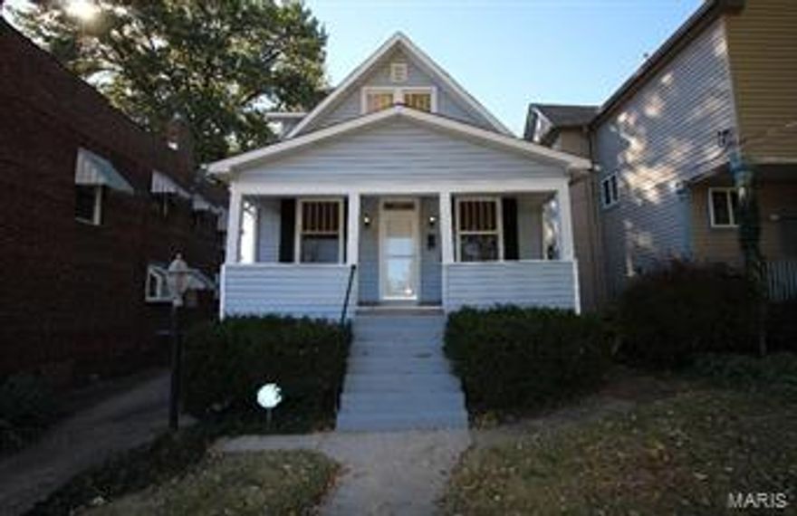 "DONT LET THIS STREET FOOL YOU..IT SITS ON A QUITE DEADEND STREET BY SOUGHT AFTER DOWNTOWN MAPLEWOOD" This 2+ Bed & updated 3 bathroom and a 2 car garage home has all the WOW FACTOR.  Fantastic updated kitchen with granite countertops and bar top and plenty of beautiful cabinets, and even stainless stain appliances.  Both the large family and separate dining room have handsome hardwood floors.  There is neutral paint colors throughout, original stain glass windows, great mill work and tall ceilings and a whole house attic fan.  Laundry is up by the bedrooms for your convenience. The walk out lower level has been updated for a great family/rec area and a full bathroom.  This home has had the electric updated so no worries here.  The seller has even installed some modern lighting and bamboo blinds...SO WELCOME HOME