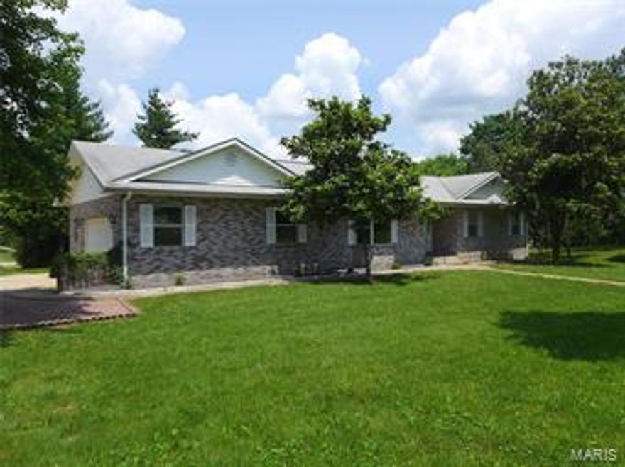 Full brick home featuring many updates including newer flooring, paint, counter tops and much more. 2 bedrooms, 2 full baths, living room, den/dinning room and an eat in kitchen make up the main level. Full, finished walk out basement with a 3rd bedroom, bathroom and an expansive family room. Other features include a new high efficiency gas furnace, on demand generator, and central vac. This home also boasts a great outdoor space with a covered rear porch overlooking the 1.15 acre shaded lot, 24x24  detached garage, great garden spot and lots of parking. This home is in a great location and is a must see! Additional Rooms: Mud Room