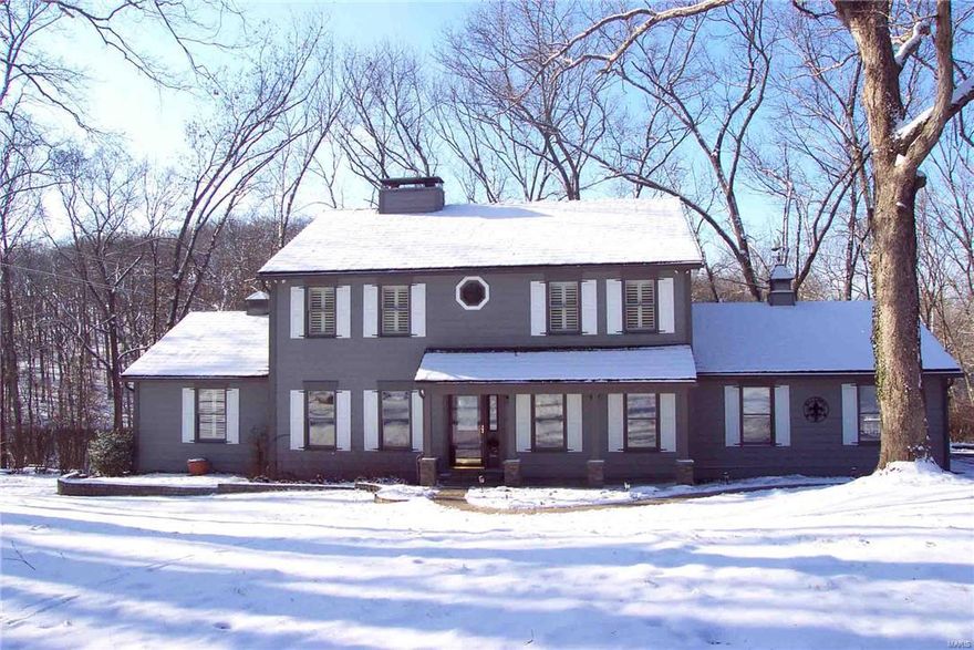 Potential Horse property! Exceptional 2-story in Wildwood situated on over 5 Private Wooded acres. 2C attached Garage and an oversized 1C detached Garage. Large Deck & multiple Patios for entertaining. Home features Hardwood floors, newer Carpet, special Millwork, Plantation shutters, 6 panel doors, Central Vac, 2 heat pumps, zoned HVAC. Updated Kitchen boasts Granite counters, solid wood Cabinetry, Brkfst Bar, smooth Cooktop, built-in Oven & large Pantry. Spacious Great Rm has a woodburning stove, Living Rm w/woodburning frpl, formal Dining Rm, 16x14 3-Season Rm, Main floor Laundry. Master Bdrm Ste with separate Den, walk-in closet, Brazilian Cherry Wood floor, updated Bath w/dbl sink vanity & tiled walk-in shower. The Walk-out Lower Level includes a large Rec Rm with woodburning stove and storage/workshop. Newer septic tank & well pump. Just minutes from all that Wildwood has to offer. Additional Rooms: Mud Room, Sun Room