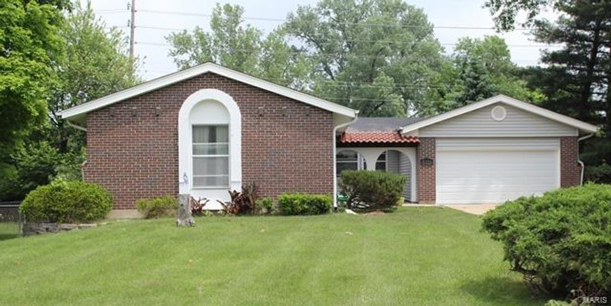 **NO SHOWINGS UNTIL OPEN HOUSE, SUNDAY, MAY 15, 1-3PM** Cute three bed, two bath ranch on large corner lot and move in ready! Enter to a spacious formal living room which opens to the large dining room, both featuring hardwood floors. Enter the kitchen featuring a breakfast room, gas cook top, and double electric wall ovens. Family room boasts vaulted, beamed ceiling, wood burning fireplace, and sliding door to back patio as well as garage access. Down the hall find the master suite with it's full bath and walk in closet with professional organization system, two more bedrooms and an updated hall bath. Lower level houses the laundry and is prime space for finishing that recreation room, playroom, or office. Two car garage, wired ADT alarm system, and fenced yard, all on a large corner lot with lots of mature trees and landscaping. Close to major interstates, schools, and local parks.