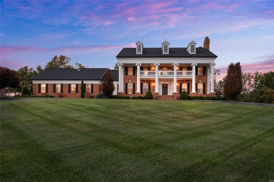 Grande landmark home in Wildwood with designer inspired interior. This majestic custom home features 5 bds,7 bths & oversized 3 car garage. Situated on 2.25 private acres. Highly desirable open concept gourmet kitchen flows into a stunning family room w/fireplace and a transitioning multi-functional butler’s bar, perfect for entertaining. Add'ly, MF features custom dual home office, luxury mbr w/fireplace, master bath w/spa shower, heated floors. ML flooring is wide planked, wire brushed hardwood throughout. Second level includes a 2nd luxury MB, glam master bath, 3 add'l bds, 2 full bths. Newly built LL has 1100 sq ft of added living space. W/ oversized media area, kitchenette, oversized full bth, separate sleeping room. Ideal for in-law suite. Upgraded systems include 2 new tankless gas water heaters, water conditioner system, 3 zoned HVAC systems w/air purification & humidifiers, irrigation system, GAF roof system. Public water and sewer. See attached upgrade sheet.  The is The One!