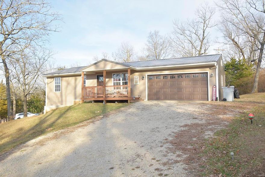 What an amazing 3 bedroom, 3 bath ranch home located on a corner lot in Terre Du Lac Lake Community.   Home had been beautifully remodeled and has 2 bedrooms and 2 baths on the main level.  Beautiful new cabinets and countertops in the kitchen.  From the kitchen you can walk out on to the large deck overlooking the nice back yard. Soo much to offer with a full finished walk-out basement with large family room, additional bedroom and full bath.  Newer A/C & Furnace, water heater.  Newer metal roof. New front porch.