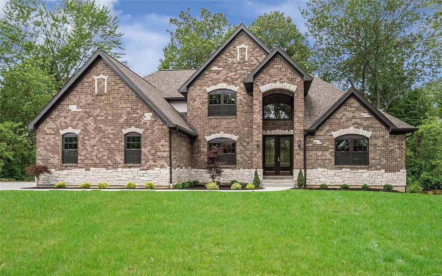 New construction in a very quiet neighborhood in Ladue Schools! This gorgeous custom 1.5 story home features 5 bed, 5.5 bath, 3-car garage, high ceilings, open floor plan is 5600 sq. f. of living space. HIGHLIGHTS INCLUDE: Main floor master bedroom and luxurious master bath with custom shower, his and her vanities with quartz vanity tops, walk-in custom closet with shelves and drawers, designer kitchen with stainless steel Kitchen Aid appliances, separate wine cooler, pot filler faucet, 42 inch custom cabinets, large island, granite counter tops, walk-in pantry, stone fireplace in spacious family rm, custom wood floors, beautiful oversized trim throughout, solid core doors; laundry room on 1st and 2nd floors, zoned heating and cooling with separate humidifiers. Finished lower level with approximately 1500 sq. f of finished space including game room, huge bedroom and a full bathroom. Too many features to list!