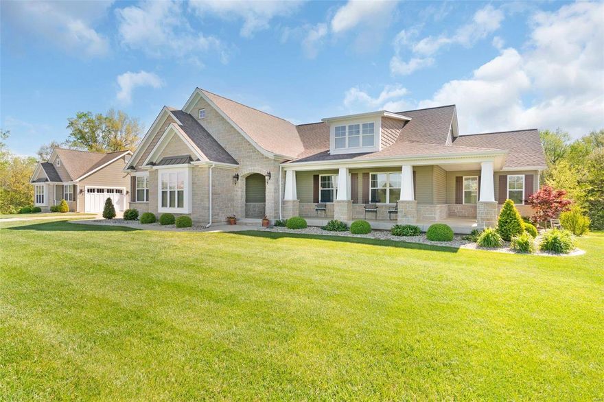 Private Ranch Home on 8 acres with beautiful views, unincorporated St. Charles Co. & no HOA. Lighted tray foyer ceiling w/5’ tall wainscoting, 4’ wide stairs, iron spindles, 10’ ceilings in Grt. Rm., Kitchen, Bkfast. & Hearth rm. Box beam ceiling in Grt. Rm. w/6’ windows & transom windows. The Kitchen has 54” Staggered Cabinets, Crown, Deep Drawers, Roll out trays, Cambria Counters, Large Island, End Panels, a triple casement window, Kohler Farmhouse sink & 2 Lazy susans.  The Bkfast rm. seats many, Hearth Rm has lots of windows w/transoms & stone FP w/raised hearth. The primary bdrm. has lighted tray ceiling & 2 walk in closets. The master bath has tiled shower w/heavy glass door, dbl. bowl adult hght. vanities, Large Kohler tub, Italian marble counters, Kohler sinks & linen closet. The LL family rm. has 2nd stone FP, bar & 3rd bath. The Detached garage & workshop is 34’x24’ w/ a 12’x24’ covered area for even more parking. Jewelry cabinet in primary closet not included. AGENT OWNED