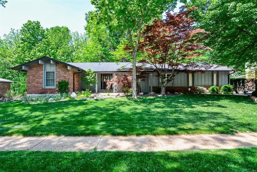 Spacious 3Bd/4Bth(2F/2H) ranch located in sought-after Ladue Park! Open floor plan w/3300+sqft of living space w/finished LL.Step inside the Entry that leads to Dining Rm w/fresh pain t&gorgeous moldings. Updated Kitchen w/42" cabinets,granite some newer appliances &adjoining Breakfast Rm w/large window&door to patio. Large light-filled Family Rm boasts built-in cabinets, full masonry FP &gorgeous wood floors. Spacious private Master Ste w/His&Her closets&updated Master Bth. Also find 3add’l Bds, full Bth &convenient Powder Rm on Main Flr. Finished LL w/large Rec Rm wet bar,Sleeping Rm w/cedar closet,Office, Powder Rm&tons of storage. Highlights: paver patio, 2water features, central vac, sprinklers, high-efficiency HVAC &2car garage. Relax outside on patio &enjoy the large yard backing to woods. Great location~close to shops, parks &restaurants - walk to award-winning Green Trails Elementary School! Easy access to Hwys64/40 &141!