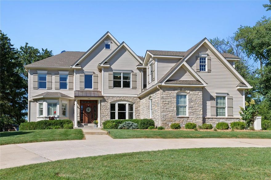 Located in Creve Coeur, close to Bellerive CC, this custom 1.5 story has so much to offer. Situated on a large level lot with a beautiful in ground saltwater pool and ample deck space. The pool is fenced, but an additional play area is also fenced separately and off to the side of the pool. Front circle drive with a 3-car side entry garage. Inside you will notice immediately the quality of the home. Triple crown moldings, 8 in base board moldings, wonderful built-ins, solid oak flooring, 10 ft ceilings. Open floor plan with GR and HR separated by a see-through gas FP. Kitchen with center island, white cabinets, granite counters, stainless appliances, double wall ovens, gas cooktop. 1st floor Master with dual closets and spacious bath with whirlpool tub, separate shower, dual sinks.  Upstairs, 4 generous sized bedrooms with attached baths and a bonus room, game/office room and 2nd laundry as well. Finished LL with game room, media area, exercise, full bath. Whole house generator.