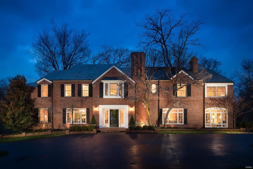 OVER 700K+PRICE REDUCTION. A MUST SEE!
With a majestic 3+ acre park-like setting in Ladue schools, this home boasts 5 Bedrooms, 7 Baths.  Inviting curved staircase, wood floors, exquisite moldings & ceiling medallions are a few hallmarks. The Living Room and Dining Room, each with sitting rooms attached are perfect for entertaining or just to cozy up with a book. An over sized Kitchen offers an abundance of cabinets, center island breakfast area, boxed beamed ceiling and more. A large family room w/ built ins, fireplace and wet bar overlooks and walks out to terraces, wooden bridges, and scenic landscaping. Enormous 2nd floor master suite with separate his & her bathrooms and adjoining over sized family room with fireplace. 4 Additional bedrooms and 2 baths complete the 2nd level. The Lower Level offers a recreation room, full bath, fitness room and abundance of storage. If that weren't enough, a pool, pool house and Gorgeous Hartley Botanic greenhouse complete this masterpiece.