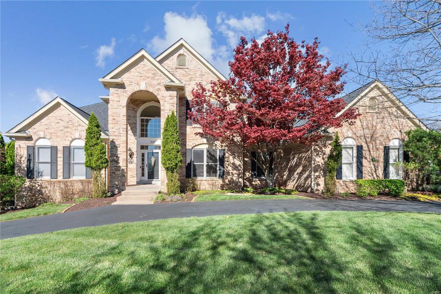 Oak hardwoods, soaring ceilings & detailed trim work define this spectacular 6000 sq ft 1.5 Sty in prestigious Pine Creek. Impressive 2-sty hardwood foyer leads to elegant dining room with French doors & stunning great room with granite bar & marble fireplace flanked by dramatic 2-sty windows. Designer kitchen featuring 42" glazed maple cabinetry, granite countertops, premium appliances & 9' crescent island adjoins hearth room with brick fireplace & convenient planning center and vaulted family room with sliding glass door that opens to patio. Coffered primary bedroom suite offers an appealing retreat with 2 walk-in closets & luxury bath with jetted tub. T-staircase accesses 3 generous-sized additional bedrooms, 1 with ensuite bath & 2 with Jack n' Jill bath. Lower Level entertainment space includes recreation room with 3rd fireplace & wet bar, game room & media room plus office/sleeping area & full bath. Situated on a tree-lined .69 acre lot with covered & open patios & 3-car garage.