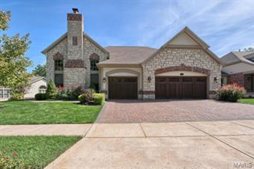 Fabulous free standing Luxury Villa! Largest plan available packed with upgraded features! Gorgeous hardwood floors,triple crown & fluted moldings,opulent dining room with large window & coffered ceiling.Two sty great room w/wall of windows, gas fireplace , built-in bookcases, 3 piece crown molding throughout. Fantastic kitchen complete w/ chocolate glaze cabinetry, huge island w/ 5 gas burner cooktop,built-in wine chiller, granite tops/backsplash & tray ceiling. Den w/ gas fireplace, upgraded mantle, stained crown molding & french doors. Master bedroom suite w/ bay window overlooks the golf course, 3 piece crown molding his & her walk-in closets. Elegant Master bath has marble vanity tops/flooring, furniture quality cabinets, Jetted tub, shower w/ body sprays. Two additional ensuite bedrooms w/ private baths. Lookout lower level has Family room, bar w/granite tops, stone fireplace 4th bed and bath. Private 3 seasons room overlooks the 5th green with nice size deck. Heated 3 car garage Location: Ground Level