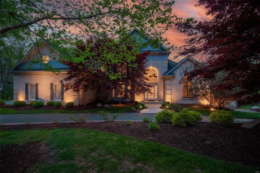 1.5 story features exceptional space/layout/amenities on 2 private wooded acres yet close to shops/restaurants! 2 stry foyer reveals open floor plan,hdwd floors & custom millwork. Main flr owners suite w/coffered ceiling,bay windows,private deck,updated vaulted bathroom w/dbl vanities,spa tub,large shower,2 walk-in closets. Custom wood paneled library w/ built-in shelves/cabinets. Beamed wood ceiling great room w/stone fireplace. The kitchen is bright & open w/center island,granite,subway backsplash,sub-zero refrigerator,breakfast room & 2 stry hearth room w/built-ins & frplc. Built-in locker at main flr laundry/rear staircase/over-sized 3 car garage. 6733sf including finished w/o lower level w/stone frplc,wet bar,full bath,gym & guest ste. All bedrooms have full baths & w/in closets. Huge 2nd flr loft room. Fantastic natural light. Back-up generator. Breathtaking exterior w/2 decks,irrigation,pergola,lighting,stone frplc & pebble tech heated pool with waterfall/slide. SEE VIRT TOURS!