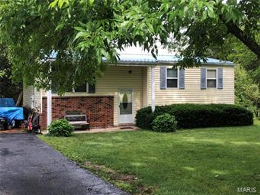Looking for a great home with quick access to 44.  3 bedrooms on main floor with full hall bath and 1/2 bath in master make this a wonderful layout.  Mostly wood floors on main level and lower level is partially finished with endless possibilities.  2 acres with a carport and shed.  Come take a look !!!