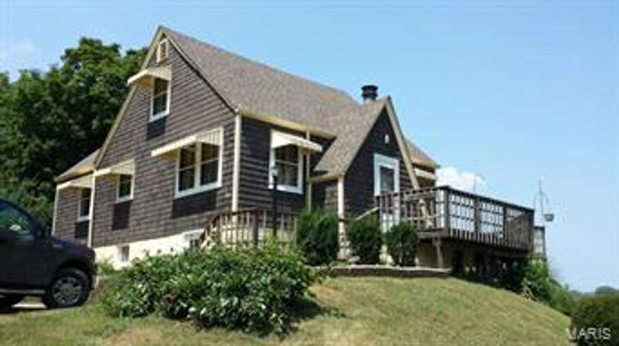 Four bedroom and 2 bath home with a beautiful view of the Mississippi River. The large deck provides a great vantage point to view river traffic. This area is also one of the largest winter migration areas for the Bald Eagle. Clarksville, MO is filled with artists, specialty craftsmen and antique shops. Clarksville is located half way between St. Louis, MO and Hannibal, MO.