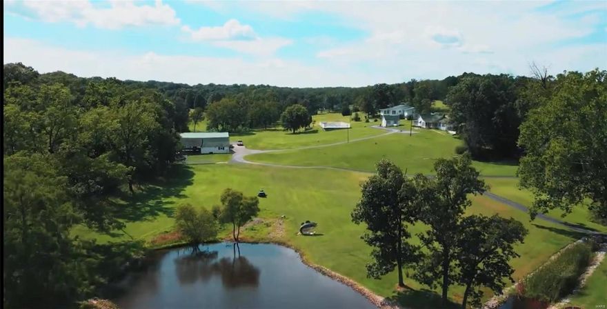 An incredible Century old Farm with so many possibilities for the new owner. Two tax id's make up this 131 acre Estate Farm. Has a 4600 sq ft Main home, 5 smaller cottages/cabins minimum of 2 bedrooms in each, kitchens, family rooms & Fireplaces.& full baths ... A perfect family estate getaway or could be the perfect investment for someone looking to have income potential for AirB&B, a great wedding venue with its park like setting. 2 Lakes, 1 Spring an inground 16x40 swimming pool (10 ft deep end), a small tavern, outside summer kitchen for those big parties and a barn, machine shed to house all of your equipment and toys for the property. A lot of different options to go with on this property.