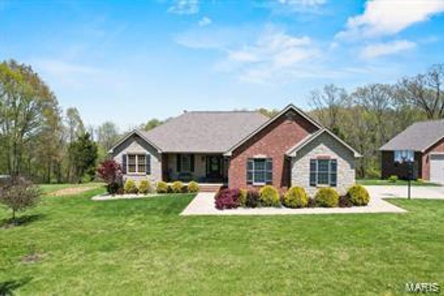 For those who are wanting privacy and a few acres near 155, and within minutes to both Cape & Jackson with all the amenities, this is your "happy place". A custom built home on top of a hill with beautiful views. The "Great Room" has a vaulted, wood ceiling and consists of LR, DR and Kitchen with an island and walk in pantry. The Master suite has a door leading into a large deck and a smaller deck for coffee in the morning. The screened porch is another quiet area for overlooking the 18 X 36 salt water pool and an adjoining deck for grilling. The lower level is perfect for entertaining with a family room and a large room with bar and a full kitchen. 4th BR could easily be added in the lower level. A second garage is in the lower level, plus the brick shop/garage detached with the interior completely finished. Heat, electric and water.  16 acres can be purchased for $917,000.  More acreage can be purchased at a later date with first right of refusal at time of purchase.