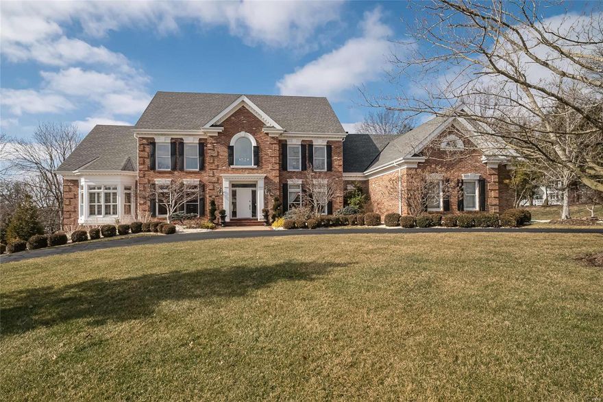 Spectacular renovation! This Johnson-built 1.5 Sty features oak & marble flooring, elaborate millwork & designer lighting. 2-Sty marble foyer with coffered ceiling leads to library-paneled study with built-in bookcases, formal dining room & stunning great room with architectural column, marble fireplace & wet bar.  Chef’s kitchen with 42” white cabinetry, granite countertops & premium appliances adjoins breakfast room with convenient planning center & wide bay window & vaulted hearth room highlighted by floor-to-ceiling stone fireplace. Coffered master bedroom suite with beautifully appointed bath with freestanding tub offers an appealing retreat. T-staircase accesses 3 additional bedrooms, 1 with ensuite bath & 2 with Jack n’ Jill bath. Lower Level includes recreation room with wet bar, game room & family room with 3rd fireplace plus workout room, 5th bedroom & full bath. Situated on a 1+ ac cul-de-sac lot with lanai, grilling station, firepit & pool surrounded by landscaped gardens.