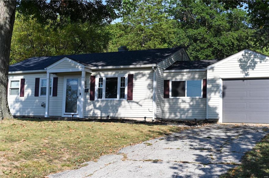 Welcome home to this well-maintained, updated home! This charming home sits on a large corner lot and features an amazing view out of the picture window in the spacious living room. This cozy home has three bedrooms with spacious closets, vinyl hardwood flooring throughout, and newer kitchen with built in kitchen office cabinets. An addition of a bonus room features walkout patio doors to the large, fenced in backyard. There is an oversized covered patio perfect for enjoying evenings and a storage shed perfect for your projects. The bathroom has a gorgeous tile floor and vanity plus an updated light fixture. Newer roof, vinyl windows, one car garage, central a/c. Conveniently close to Highway 44 and Historic Route 66! Make an appointment to see this move-in ready home! It won’t last!