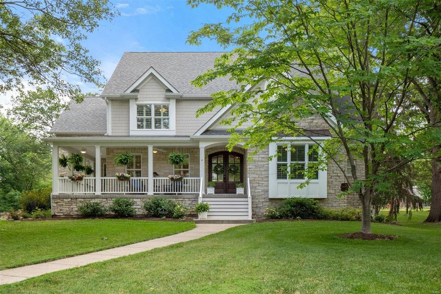 Builder’s personal home with all the updates you'd want, and a charming Southern Living-style façade! The enormous windows, high ceilings and open floor plan inspire joy from the first moment you enter. Cocktail on the wrap around porch or host a party for 100 with equal fluidity. The kitchen/hearth room with custom details make every night an opportunity to connect with those dearest to you. Your four legged friends will spend their days chasing wildlife in the huge backyard, or laying on the oversized mudroom’s cool tile floor. Primary suite on 1st-floor is a sexy retreat with stunning views of the backyard. Additionally, there’s a second 1st-floor guest suite/office with a full bath. The upstairs offers enormous bedrooms, walk-in closets, and comfortable baths. Fantastic finished lower level with dedicated spaces for multiple uses. Circular drive leads to oversized 3-car garage. The convenience of the location gets you in Clayton, Forest or Tilles Park & West End in 5-10 minutes.