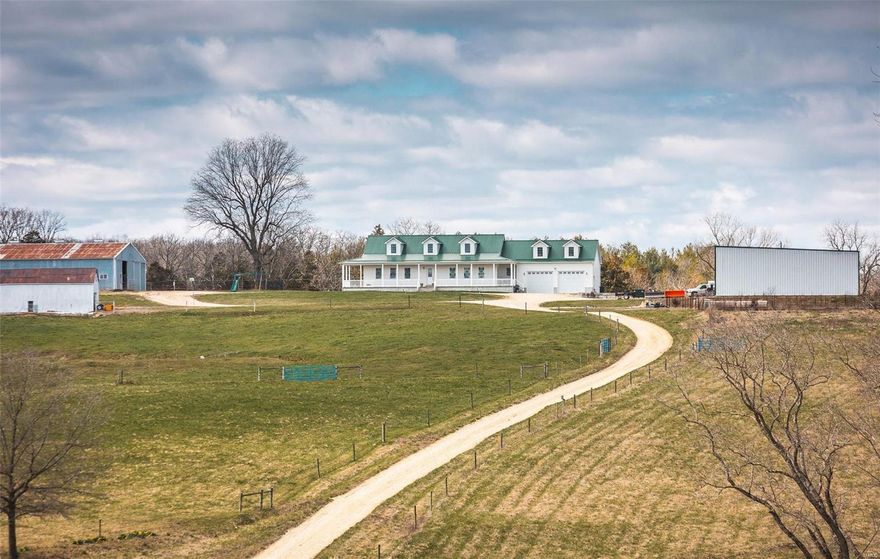 Stunning 90 acre property with a 6 year old custom built home. Rare opportunity offering seclusion and spectacular views from your front porch. With an 80x100 shop, 8 stall barn, & 27+/- wooded acres this property offers something for everyone. Home offers 2360 sqft 3 Bed 3 Bath on main level with 10 ft ceilings and 8 ft doors. Spacious open concept floor plan with a foyer that leads to the living room, dining room, and kitchen space. Master suite has large custom shower and walk in closet. A jack and jill bathroom separates the two additional bedrooms. Kitchen boasts granite counter tops and a large island and breakfast bar. Half bath located off of the living room along with a pantry and laundry room. Laundry is conveniently located off the heated two car garage. Full unfinished basement has a roughed in bathroom and perfect space to expand. With fencing, cross fencing, an outdoor arena, automatic waterers, & a 1 acre pond this property is ready for its new owners.