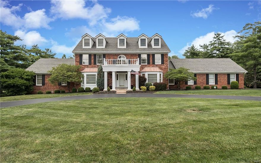 Sophisticated 1.5 story 5 bedroom 4 full & 2 half baths in premier Strathmore subdivision in Town & Country. Situated on 1 acre parklike setting w tranquil water view. From the gracious 2 story entry grasp the magnificent moldings throughout the over 5000 square feet just on the 1st & 2nd floors. Looking for spacious - the room sizes are spectacular. 9 & 10 ft ceilings 1st floor plus many coffered ceilings. Beautiful wood floors 1st & 2nd levels. Sweeping front & rear staircase. The gourmet cook will enjoy the Wolf cooktop, hood, double ovens & warming drawer, Subzero, Bosch dishwasher & granite counters. Immense 1st floor master suite includes 12 ft custom closet. Finished walk-out lower level features huge recreation spaces, large wetbar area & full bath. Spend hours enjoying coffee or entertaining on the aggregate covered patio which leads to the Pooltron built Pebble Tec finish pool overlooking the magnificent yard siding to the neighborhood water feature. Circle drive. Additional Rooms: Mud Room