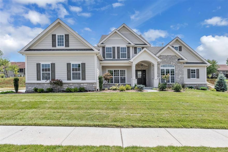 Spectacular 1.5 story by Prestige Custom Homes on a large home site in the Schoettler Grove subdivision. This 4 bedroom, 3.5 bath, home features a 3-car side entry garage, outdoor room, hardwood flooring, gourmet kitchen with custom cabinetry, crown molding, soft close drawers, quartz countertops, Kitchen-Aid stainless steel appliances, under cabinet lighting, built-in lockers, and impressive hearth room with vaulted ceiling and stone fireplace. Soaring 2-story great room offers a fireplace, wet bar with beverage cooler and wine rack, study with vaulted ceiling built-in bookcases. Elegant master bath suite boasts coffered ceiling, separate custom walk-in closets, adult height vanities, stand-alone tub, and vaulted ceiling in master bath. Other amenities include an expansive 2nd floor bonus room and granite vanity tops throughout. Additional Rooms: Mud Room, Sun Room