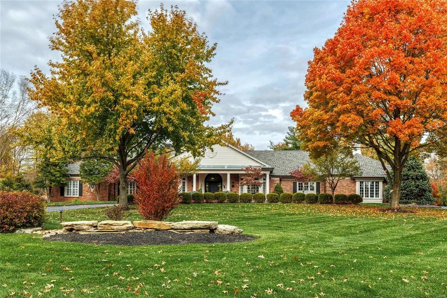 Beautifully designed brick ranch home from Higginbotham Bros. Built to commercial standards with over 8000 sf of living space enhanced by handscraped hardwood & Antica Apia stone flooring, soaring ceilings & exquisite millwork. Impressive marble foyer leads to coffered living & dining rooms with wide bay windows & stunning family room with floor-to-ceiling stone fireplace & wet bar. Designer kitchen with glazed cabinetry, granite countertops & commercial grade appliances adjoins light-filled breakfast room & octagonal gathering room. Coffered master bedroom suite features His & Hers closets & lavish bath with access to hot tub patio. 3 Additional bedrooms, 2 with Jack n' Jill bath, & hall full bath complete the main floor living quarters. Lower Level includes recreation room with brick fireplace & oak wet bar, game room, media room, workout room & full bath. Atrium doors open to outdoor living room with fireplace & grilling station plus pool & hot tub surrounded by landscaped gardens. Additional Rooms: Sun Room, Wine Cellar