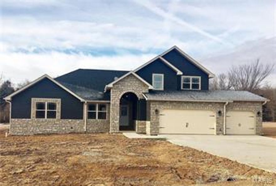 A beautiful house for a BEAUTIFUL setting in the sought after neighborhood of The Quarry! This New Construction home is planned to feature 5 bedrooms, 2.5 baths, main floor master suite w/ walk-in closet, fireplace, wood floors in main floor living area, solid surface counter tops, center island and stainless appliances in the kitchen and MUCH, MUCH more! Get in on this new build before it's complete and builder will discuss possible upgrades upon request. Call for more info today!