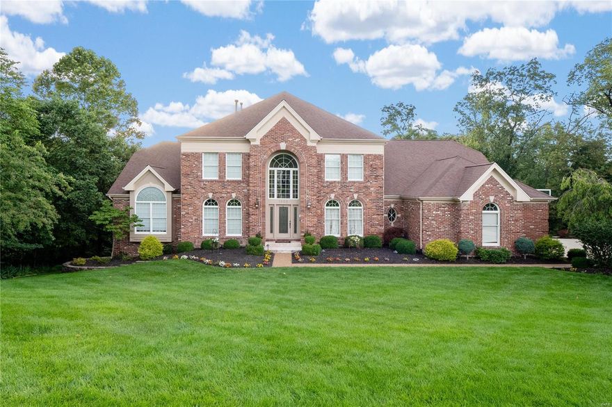 Exceptional 1.5-story home on a 1-acre private cul-de-sac lot. Features include an inground pool, covered patio, and firepit. Extensively updated throughout. Front and rear staircases, spacious dining room, and office/living room. 2-story great room with stone fireplace. Updated kitchen with custom cabinets, breakfast bar, double ovens, and warming drawer. Custom tile backsplash, butler's pantry, and walk-in pantry. Kitchen opens to large hearth room with vaulted ceiling and stone fireplace. Main floor master suite with luxury updated bath, heated floors, custom shower with multiple heads, and walk-in closet with custom shelving. Upper level features loft area, 3 bedrooms, one with private bath, and a Jack and Jill bathroom. Walkout finished lower level with rec room, gas fireplace, game room with wet bar, exercise/hobby room, large bedroom, and full bath. Lush landscaping, inground sprinkler, 3-car garage, security system, and more!