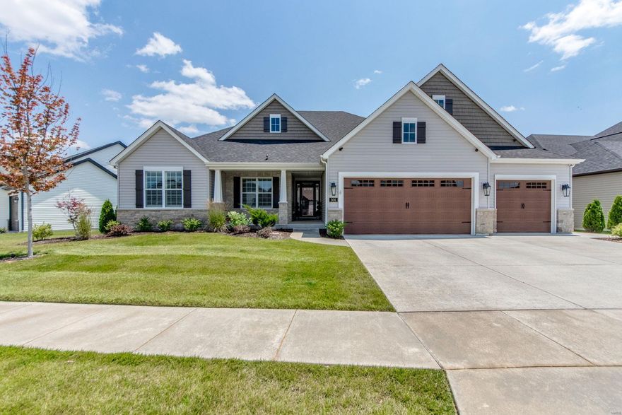 **Exceptional 2yr old Lombardo built home w/4300+ sq feet includes soaring 11ft ceilings, custom millwork, real hardwood floors, 3 FP’s & dedicated private office. At the heart of the home is a gorgeous kitchen ready to serve any size gathering! You’ll Love this space w/timeless white cabinets, huge island, 3 ovens, 6 burner gas range & walk-in pantry! The hearth room leads to a screened porch complete w/a fireplace & views of Busch Conservation Area. The owner’s suite has its own separate wing w/luxury bath & 2 walk-in closets. A split bedroom plan includes 2 additional bedrooms on the main floor & 2 in the lower level offering flexible space for family & overnight guests. How would you use the walk-out lower level: in-law-suite, sports bar, hosting movie/game night? Why build when you can save time & money! Contact agent for full list of upgrades & custom features.