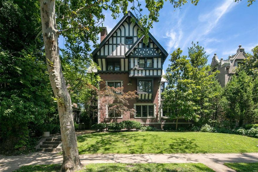 This stately turn-of-the-century Tudor offers a striking blend of original historic character and modern renovations. Perfect for entertaining, the circular floor plan flows from one room to the next while remaining extremely liveable for today's daily life. Natural light bathes the kitchen, outfitted with a walk-in pantry and SubZero, Wolf, and Bosch appliances. The Master Suite caters to relaxation and rejuvenation with a coffee bar, private rooftop garden oasis, two Master bathrooms, a large walk-in closet, and 2nd-floor laundry room. Three additional bedrooms on the 2nd floor, with plenty of extra space on the 3rd floor for guests/office/yoga/artist studio. Other updates include zoned AC, flat roof systems, refinished oak floors, and water heaters. Owners have meticulously maintained the slate roof, tuckpointed, and preserved the home's exterior. Located on a private/gated street in the heart of the Central West End. Lot can fit a 3 car garage. COOL: 14 SEER+