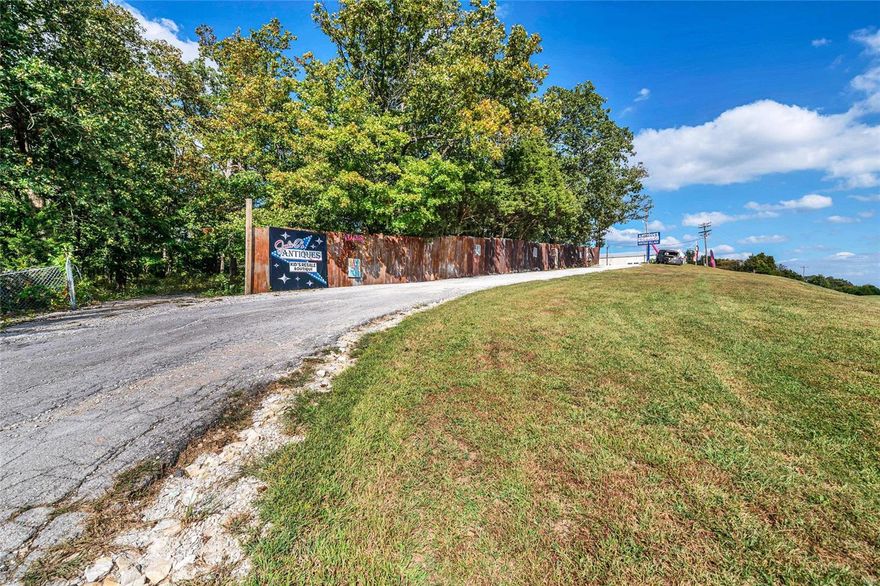 ENDLESS OPPORTUNITY RIGHT HERE!! AWESOME LOCATION!Take advantage of this High Visibility 19+ Acre property w/ a TON of improvements!Currently used as Auction House,(Jackie O's)-The 8400 sq ft, AMISH Built Building w/ Handicap bathrooms, Full kit, Office, dressing rooms, concrete flr, electric, 12' Garage dr & full HVAC!Additionally, a 70X40 Multi-purpose Commercial build.,previously a church, & then a resale store,& A 48X30 pole & metal structure unattached garage/shop building w/ 2 roll-up doors, concrete flr & electric.Lastly,(3) sets of storage units, 30X18=18units, double deep, 220X15=25 units,& 140X30!Truly, a Beautiful piece of land, approximately 1/2 woods (with pond) & 1/2 pasture land.There is a deep well, septic, & asphalt as well as gravel parking lots. Manufactured Home is on public water.  CALL listing agent for your Private showing today- LAND, Improvements, & possibly inventory is for sale- NOT the Biz itself. All leases w/ the rental units will go to the new owners.